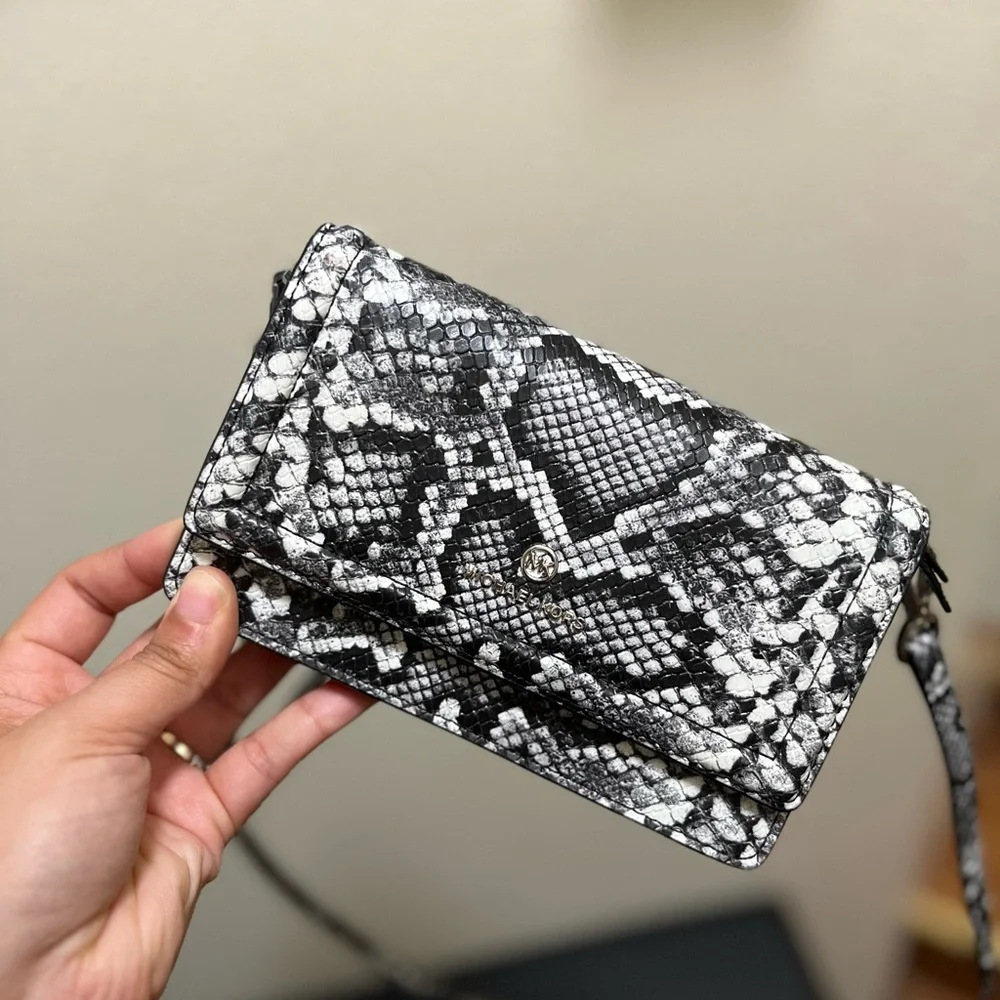 Michael Kors snake features strap
